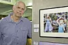 Bill Beuther poses with his photograph “Enthralled,” which received a merit award in the 22nd annual Aquarius art exhibition.