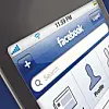 Close-up of Facebook app on a smartphone screen.