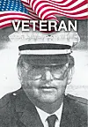 Portrait of a veteran in uniform with an American flag background.