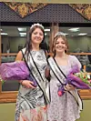 Two young women in pageant attire holding bouquets.