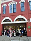 Group of students in front of a historic building in Medina.