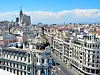 Aerial view of Madrid with buildings and blue sky.
