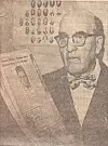 Man in glasses holding a newspaper with images in the background.