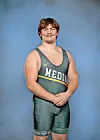 Wrestler in green uniform with 'Medina' and Nike logo.