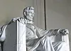 Statue of Abraham Lincoln seated in the Lincoln Memorial.