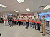 Ribbon cutting ceremony with students at Frederick County Academy.