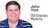 Professional portrait of John Yost.