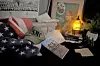 Display of military memorabilia including a flag and photographs.