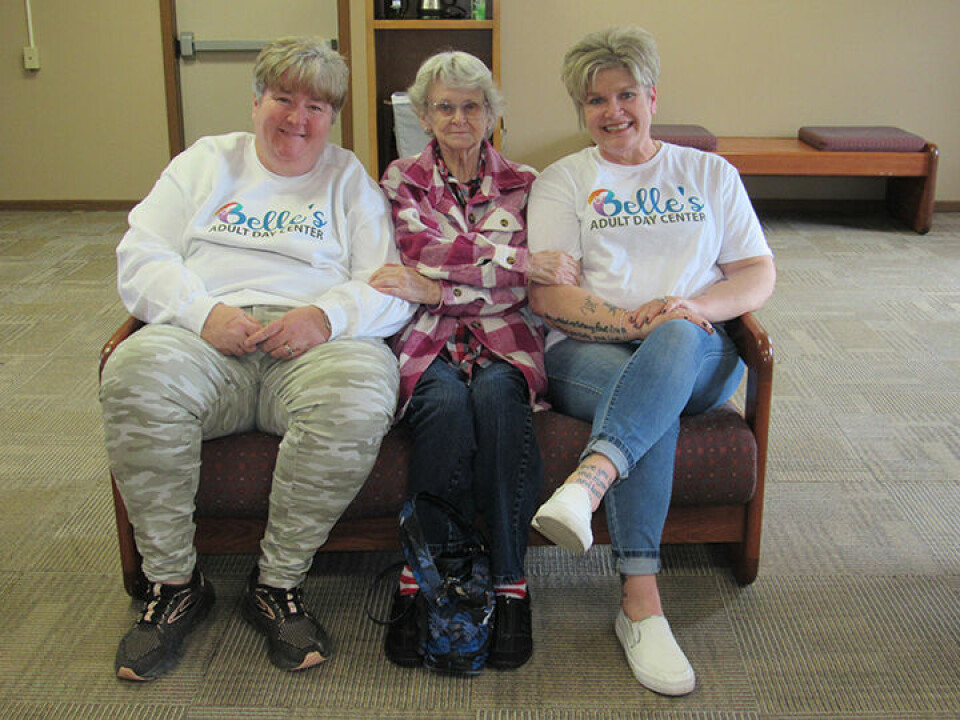 CCM/Thomas ClapperFrom left: Owner/Manager Mindy Weiland, Belle’s customer Ruth Syler and Activity Director Nicole Potts sit in the lounge area at Belle’s Day Center.