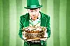 Leprechaun with a pot of gold on a green background.