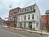 Historic buildings with construction barriers on Main Street.