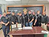 Group of law enforcement officers at a recognition ceremony.