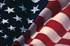 Close-up of the American flag with stars and stripes.