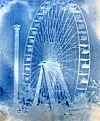 Blue-toned image of a Ferris wheel.