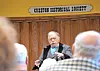 Speaker addressing an audience at the Creston Historical Society.