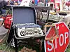 Vintage typewriter displayed at a flea market.