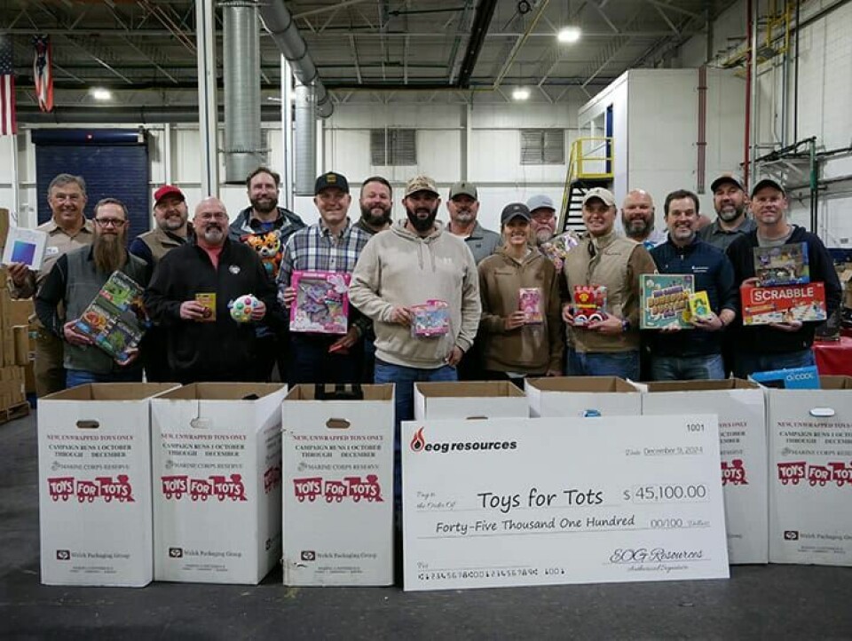 CCM/Thomas ClapperEOG Resources, Inc., employees and village officials at the Toys for Tots distribution on Dec. 9 include: (front row, from left) Mark Barbier, Chris Kiehl (Carroll County Engineers Office), Matt Gastgeb, Anthony Geissinger, Aubrey Meadors, Heath Work, Rick Ogle and Jamie Smith; (back row) Ted Kelly, Jody C Jones, Sam Harms, Brock Hutchison (Brown Township Trustee), Ben Blackwelder, Troy Schupp, Chris Rotondo (Brown Township Trustee) and Lucas Shipper.