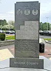 Medina County memorial with engraved medals and names.