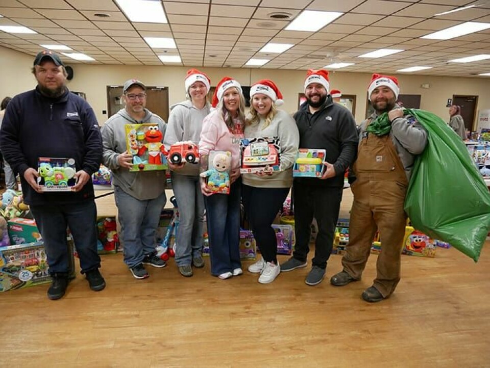 CCM/Thomas ClapperApproximately 20 Williams employees assisted at the Scio Toys for Tots event at the Scio Volunteer Fire Department on Dec. 3 including (left to right) Jesse Manbeck, Brett Shaw, Colby Burton, Michelle Carpenter, Maggie Allen, Kyle Hood and Clay Edwards.
