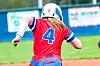 Softball player in red and blue uniform running.