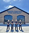 Firefighters in front of South Central Fire District station.