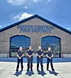 Firefighters in front of South Central Fire District station.