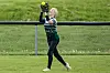 Softball player catching a ball in the field.