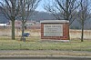 Knox County government office sign in a grassy area.