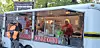 Food truck with staff serving customers in Dover, Ohio.