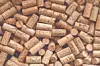 A variety of wine corks laid out together.