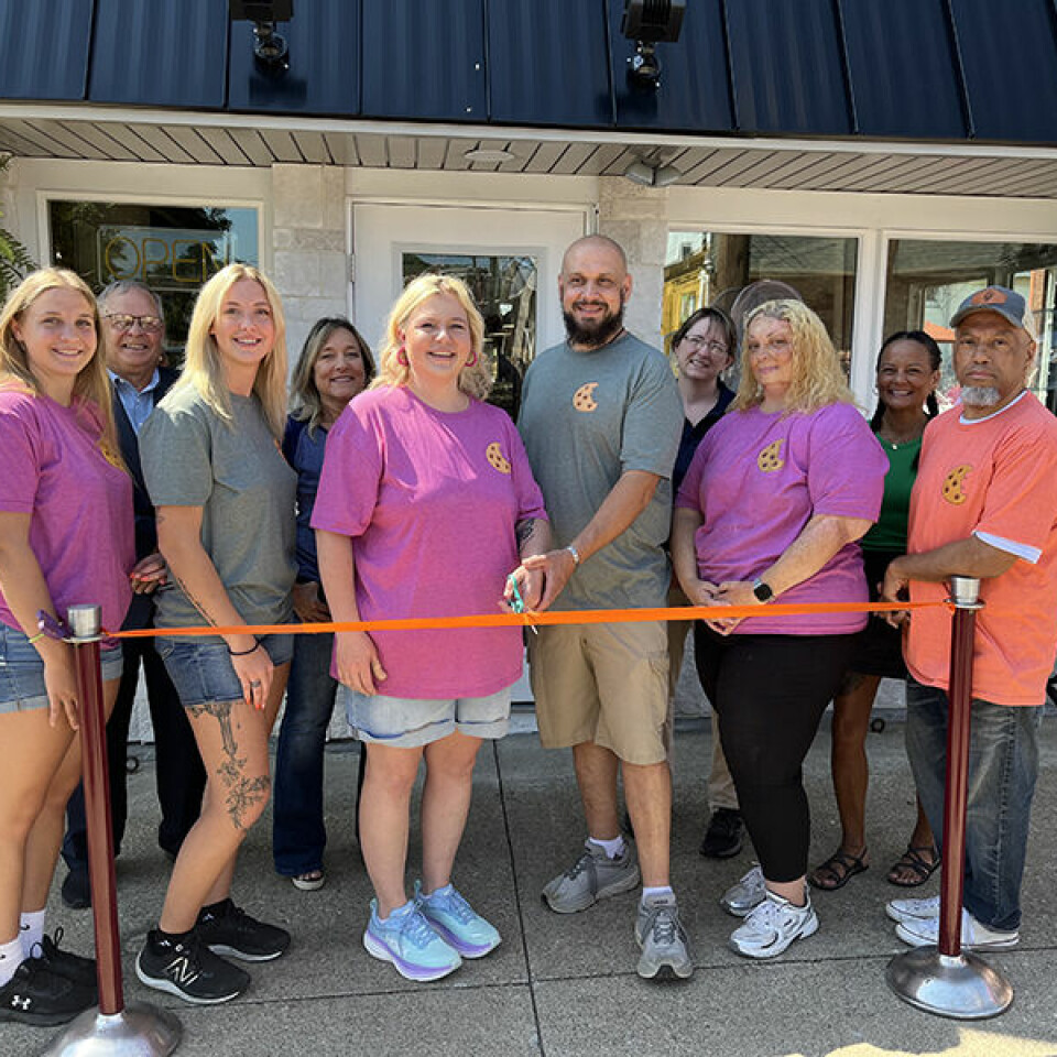 Submitted Photo(front, from left) Rebecca Jackson, Michaela Jackson, Jennifer Jackson, Marvin Jackson, Kristina Case, and Ken Jackson; (back, from left) Minerva Mayor Tim Tarbet, Minerva Chamber board member Michele Catlett, Minerva Village Councilwoman Jennifer Jordan, and Minerva Chamber board member Deborah Palmer.