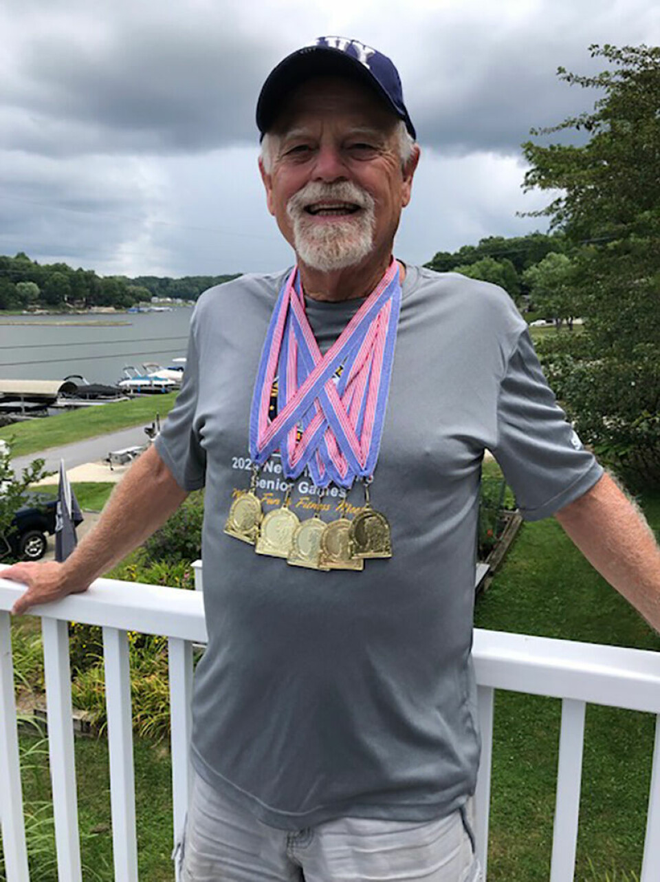 Submitted PhotoDave Lange wears the five first place medals he won at the recent New Hampshire Senior Games.