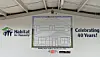 Habitat for Humanity banner with a floor plan and “Celebrating 40 Years!” text on an interior wall.