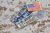 U.S. Army and U.S. Navy name tapes and an American flag patch on camouflage fabric.