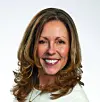 Portrait of Debbie Kiley, Medina County Job & Family Services director, smiling against a plain background.