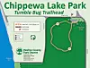 Trailhead sign with a map of the Tumble Bug Trailhead at Chippewa Lake Park.