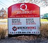 Roadside sign for CrossBridge listing marketing, website, video, advertising, print, printing, design, and truck service.
