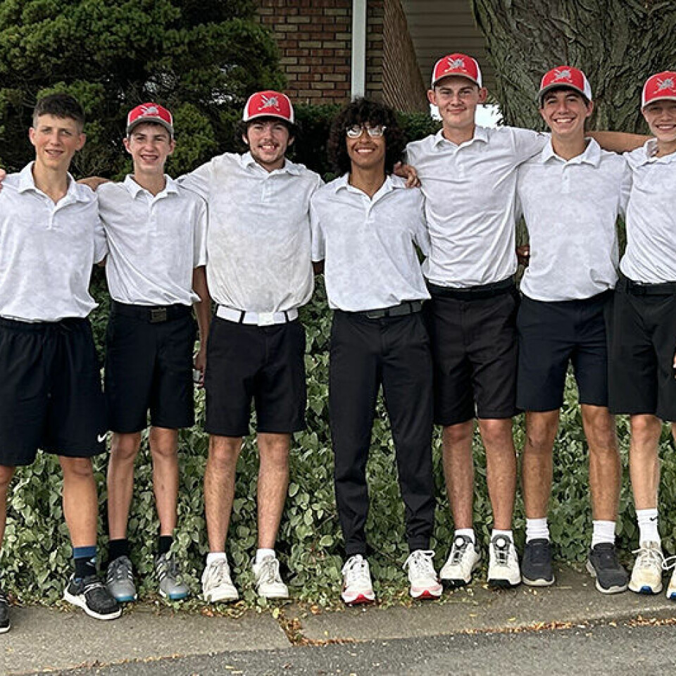 Submitted Photo Members of the league tournament champion Minerva Lions are shown following he win. From left are: Parker Linkous, Wil Blackburn, Carsen Earley, Dario Sevek, Reid Spall, Jeremiah Smith and Tyson Fetty.