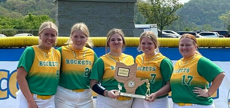 Submitted PhotoConotton Valley seniors (from left) Tiffany Donato, Mariah Donato, Delaney Peters, Masy Baker and Alexis Booth display the team’s OVAC championship trophy.