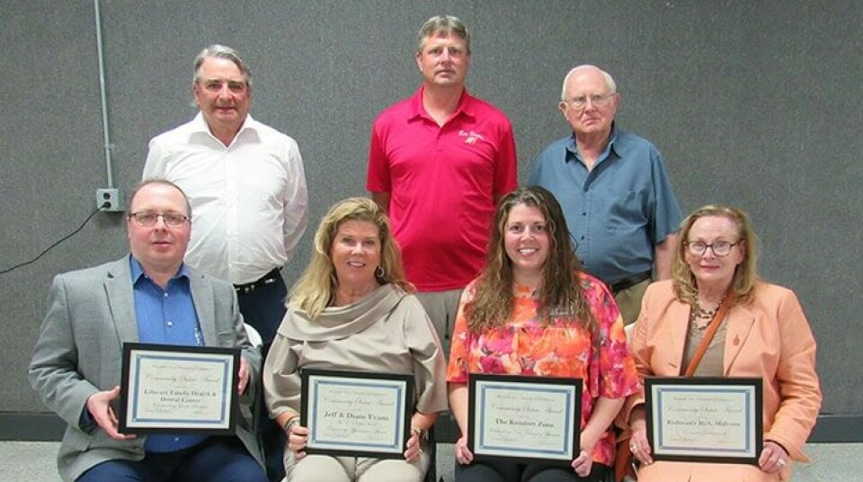 CCM/Thomas Clapper Community Salute Awards were awarded to the following Minerva businesses. Seated (from left): Eric Niemeyer, CEO of Lifecare Family Health and Dental Center, Diane Evans, E. David Hank Appreciation Award winner, Ashleigh Kramer, of The Komfort Zone and Jan Kishman of Kishman’s IGA; (back row) E. David Hank Appreciation Award winner Jeff Evans, and Kevin and Duane Ray of Ray Electric.
