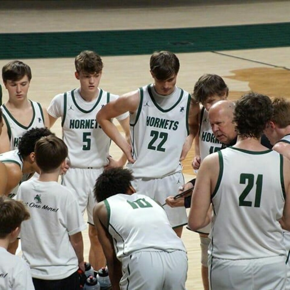 Submitted Photo Malvern Coach Dennis Tucci talks to his team during a time out at the regional final contest at Ohio University March 16. The Hornets fell to Harvest Prep 64-44 but completed the winningest season in school history.