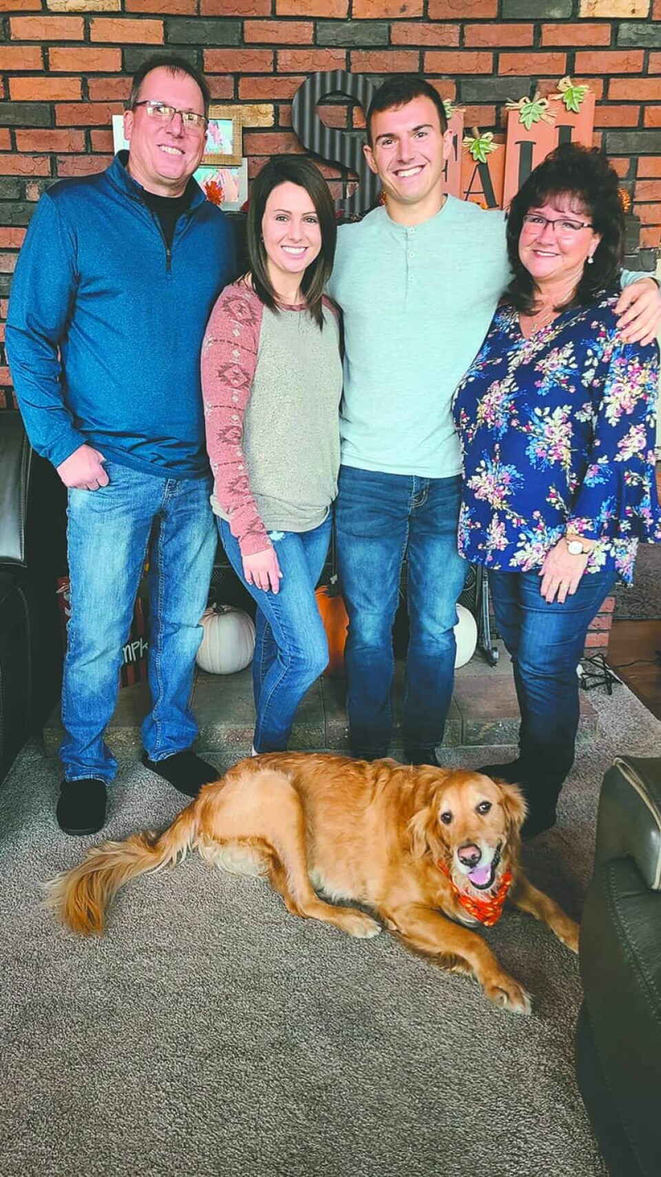 Submitted PhotoThe Ruegg family consists of (from left) Ron Ruegg, daughter Gina Szittai, son Anthony Ruegg and wife Becky Ruegg with dog Riley.