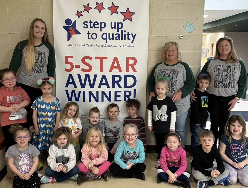 Malvern preschoolers pose with the five-star poster.