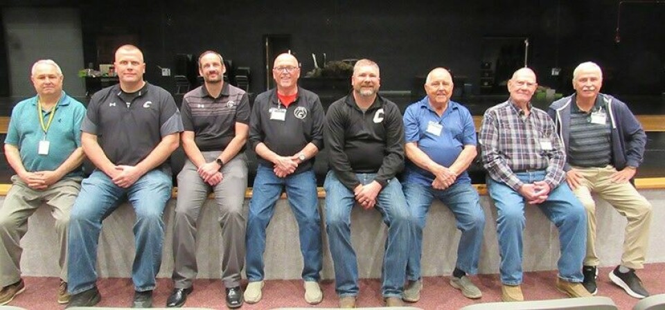 CCM/Carol McIntireThe group of athletic directrors (AD) and assistants at Carrollton Schools attending a recent retirees luncheon spanned 54 years. Seated from left are Ron Colaprete, current assistant AD; Caleb Crowl, current AD; Jason Eddy and Mark Spears, former ADs; Timmy George, representing his late father, Howard George; Tom Postlethwait and Bob Bird, both former ADs; and Curt Hensley, former assistant AD.