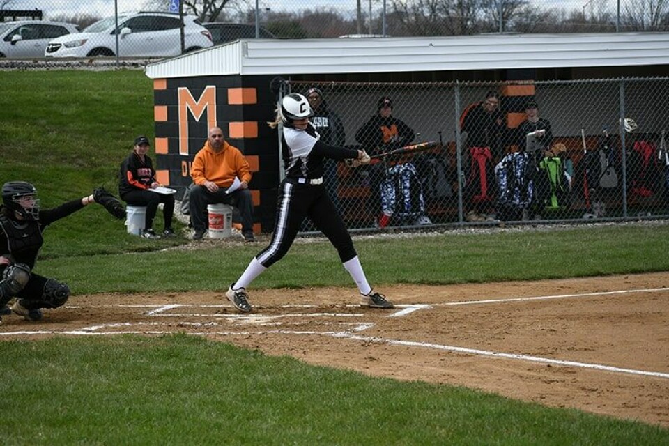 CCM Dan RiesCarrollton senior Maleyna Havens connects on her first of two home runs against Marlington April 6.