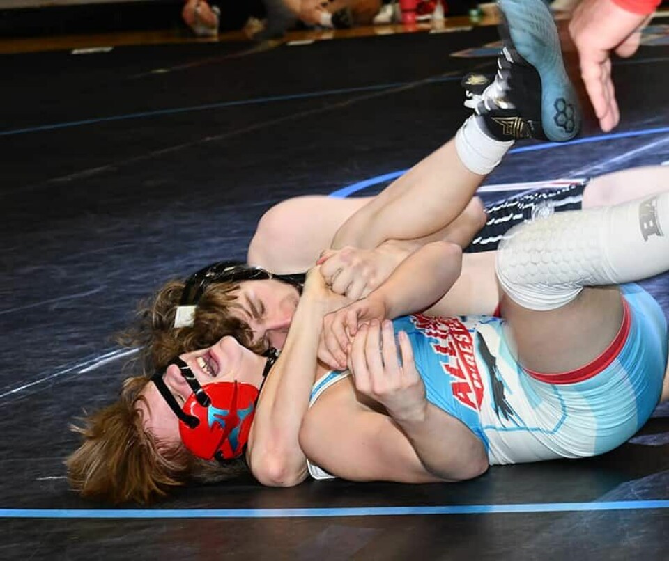 CCM/Carol McIntireWarrior Darrion DePalmo (rear) pinned Aviator Logan Kager with 41 seconds remaining in the 150 lb. match to close out the victory.