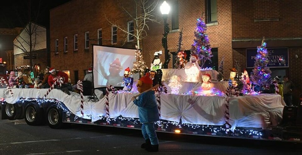 CCM/Carol McIntireThe Claus family was treated to ride on open air fire truck, driven by Ron Dennis, with his wife, JoAnn, in the passenger’s seat.Members of the local band John Doe provided commentary and announced each unit as it entered the bottom of Public Square. The group also announced the judge’s decisions in the six award winning categories, including:White Christmas Award (best marching group or walking unit): Carrollton High School Marching Band.Rudolph Award (best entry featuring animals): Poodles.Polar Express Award (best entry featuring children): Star Struck Dance.Elf Award (most humorous entry): Kick Cancer in the Grass.Christmas Vacation Award (best decorated vehicle, ATV, tractor, no floats): Doug Miller Family with the Grinch sleigh pulled by Max the dog.Christmas Story Award (best overall entry): Sheckler Excavating. Prior to and following the parade, children had the opportunity to enjoy a portable skating rink and slide on 2nd St. SW, where food trucks were set up and Santa and Mrs. Claus visited with children.