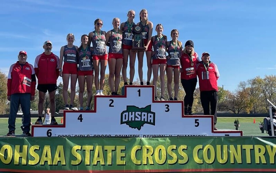 CCM/Carol McIntireThe Minerva Lions captured the school’s second Division II state title in three years Nov. 4 at Fortress Obetz. From left are Assistant Coaches Dick Rutledge and Arin Rettig, Sam Crissman, Makenna Jones, Annabelle Crissman, Hannah Ison, Katie Ison, Kayla Crissman, Gabby Lupshu, Makenzie Beavers, Coach Olivia Scott and Assistant Coach Frank Monk.