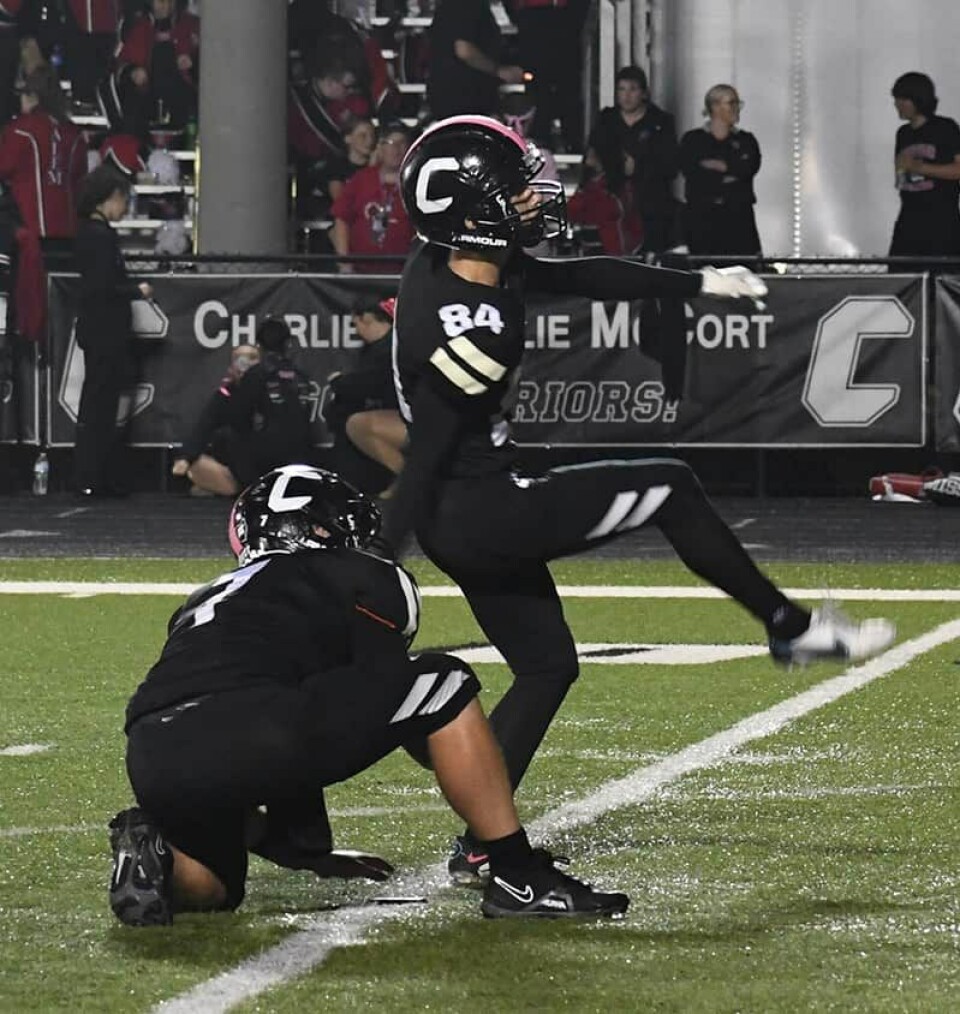 CCM/Dan RiesCarrollton kicker Quentin Rosenberger (84) kicked his 100th extra point Friday against Salem. Jacob Whitmore is the holder