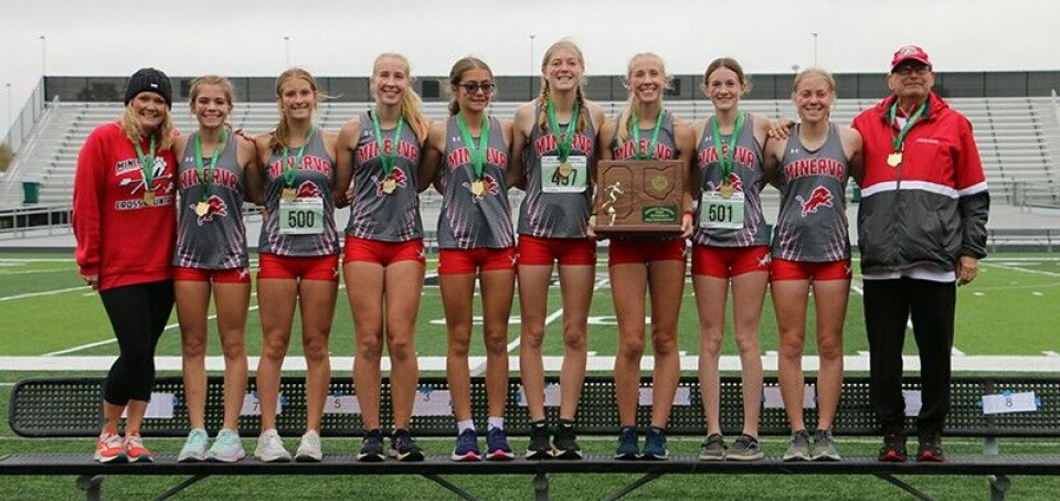 Photo by Janet LaneThe Minerva girls cross country team capture the Division II Regional Title and advanced to the state meet this Saturday. From left are Coach Olivia Scott, Makenzie BeaversMakenna Jones, Hannah Ison, Annabelle Crissman, Kayla Crissman, Katie Ison, Gabby Lupshu, Sam Crissman and Assistant Coach Frank Monk.